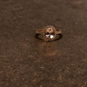 Oval Morganite and 1/5 CT. T.W. Diamond Frame Ring in 10K Rose Gold